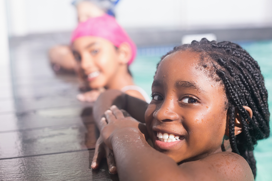 children having a good time in the pool