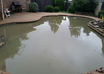 Heavy rains caused pool to wash in